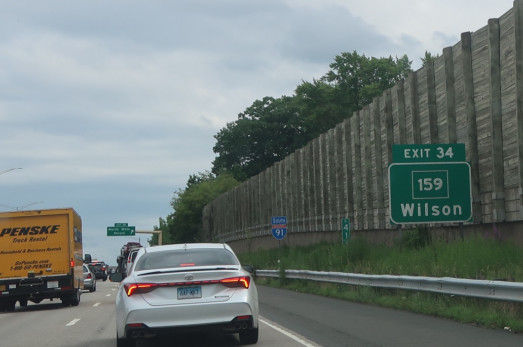 File photo: I-91 southbound in Windsor with an Exit 34 sign for Route 159/Wilson, before Connecticut’s mileage-based exit-renumbering project.