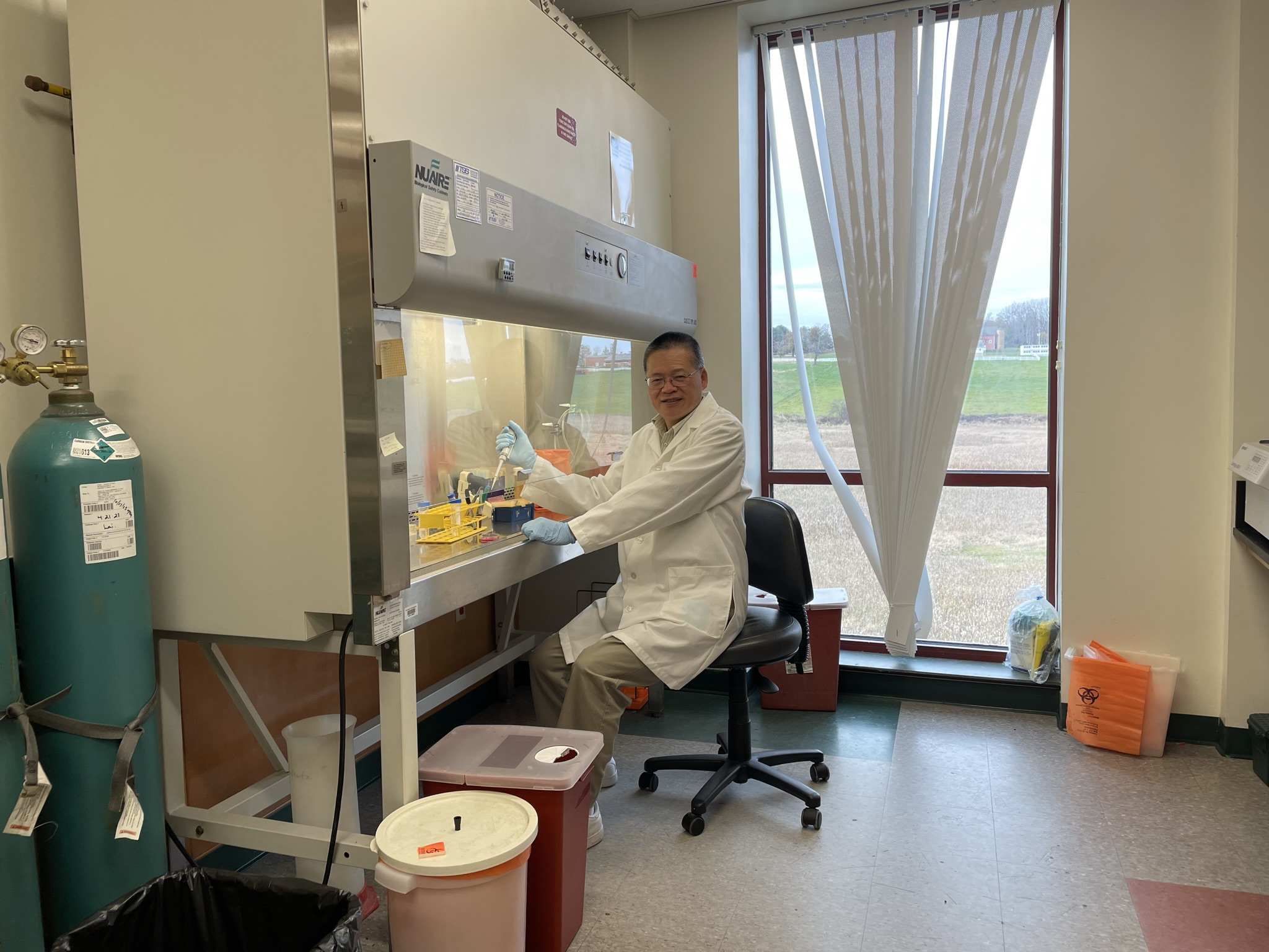 Laijun Lai, research professor of allied health sciences, works in his laboratory.