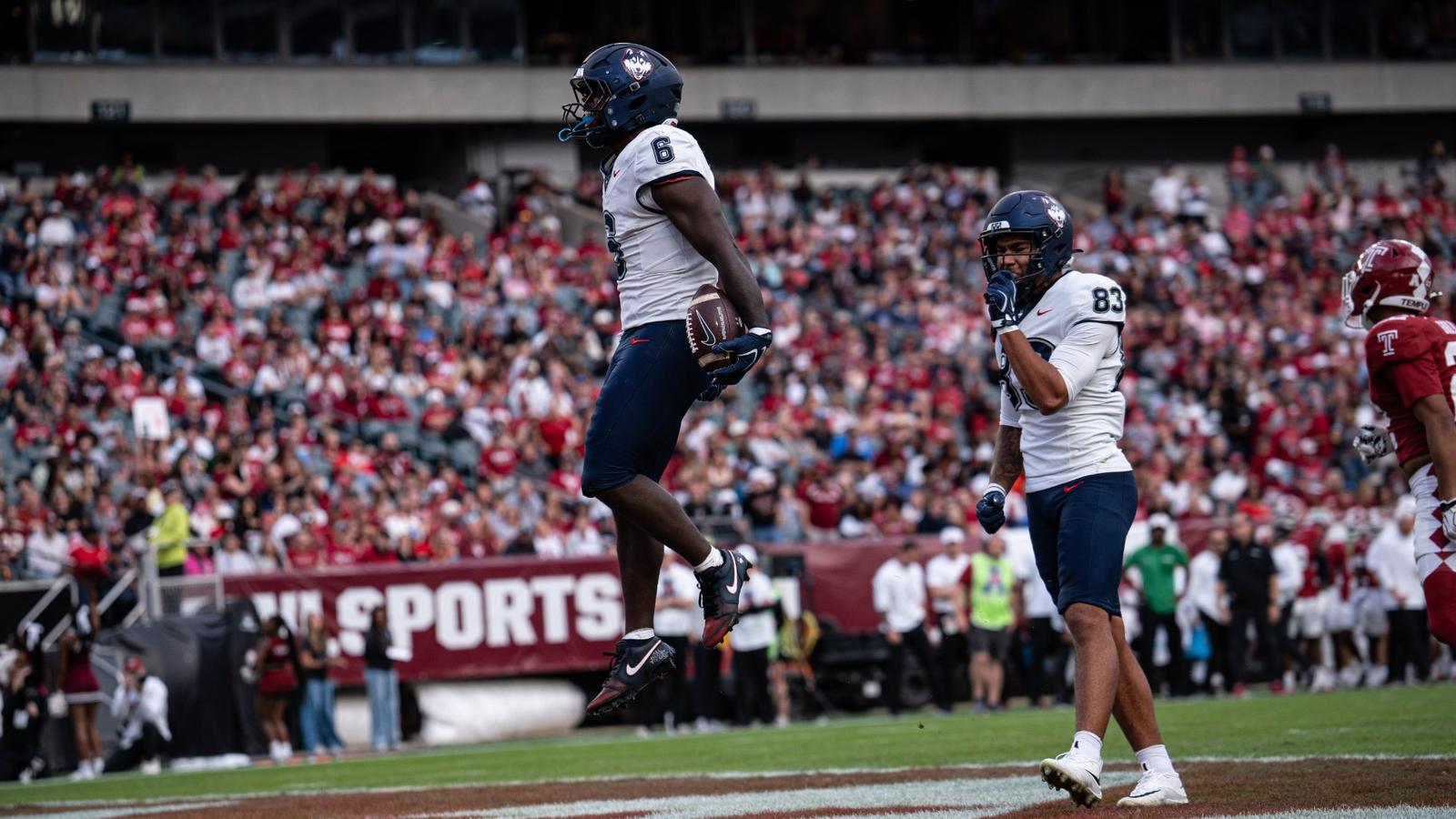 UConn football photograph accompanying the university’s Temple match report.