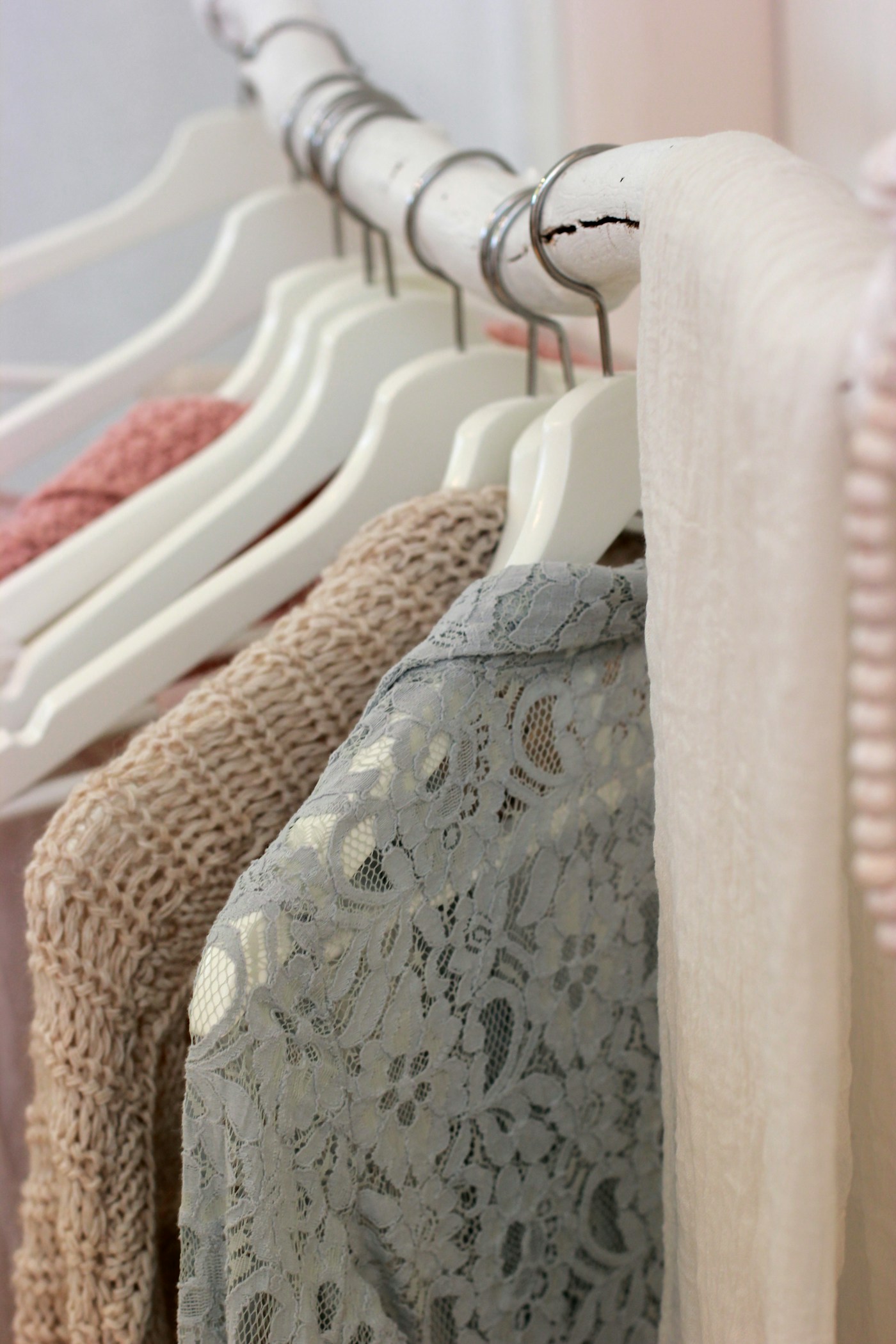 File photo: Clothes hanging on a white clothing rack; not the people, place or event in this story