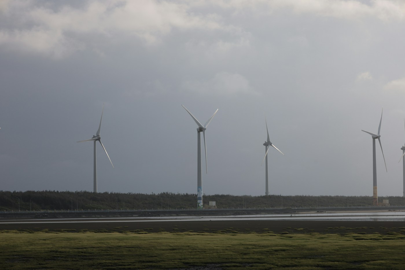 File photo: Row of wind turbines on a cloudy day; not the people, place or event in this story